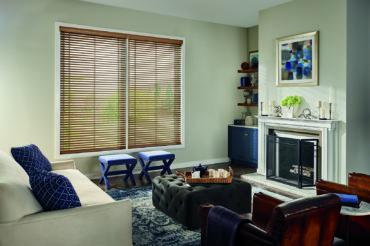 Graber wooden blinds in a home's living space. Available at The Blind Broker of Kansas City.