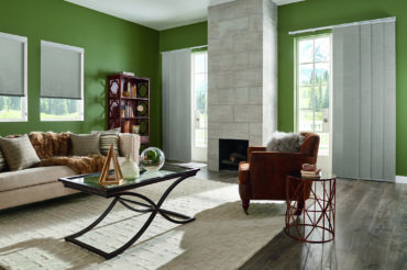 Graber solar shades in a home living space, adding to the natural tones used throughout. Available at The Blind Broker of Kansas City.