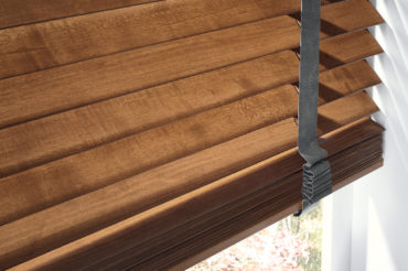 Graber wooden blinds, featured in a home interior. Available at The Blind Broker of Kansas City.