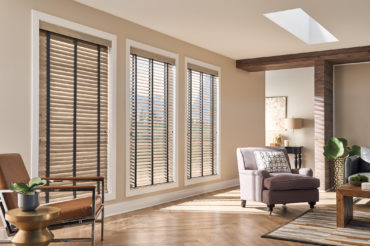 Graber wood blinds in a home living room. Available at The Blind Broker of Kansas City.