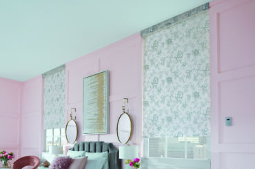 Graber brand roller shades featuring a floral design. Available at The Blind Broker of Kansas City.